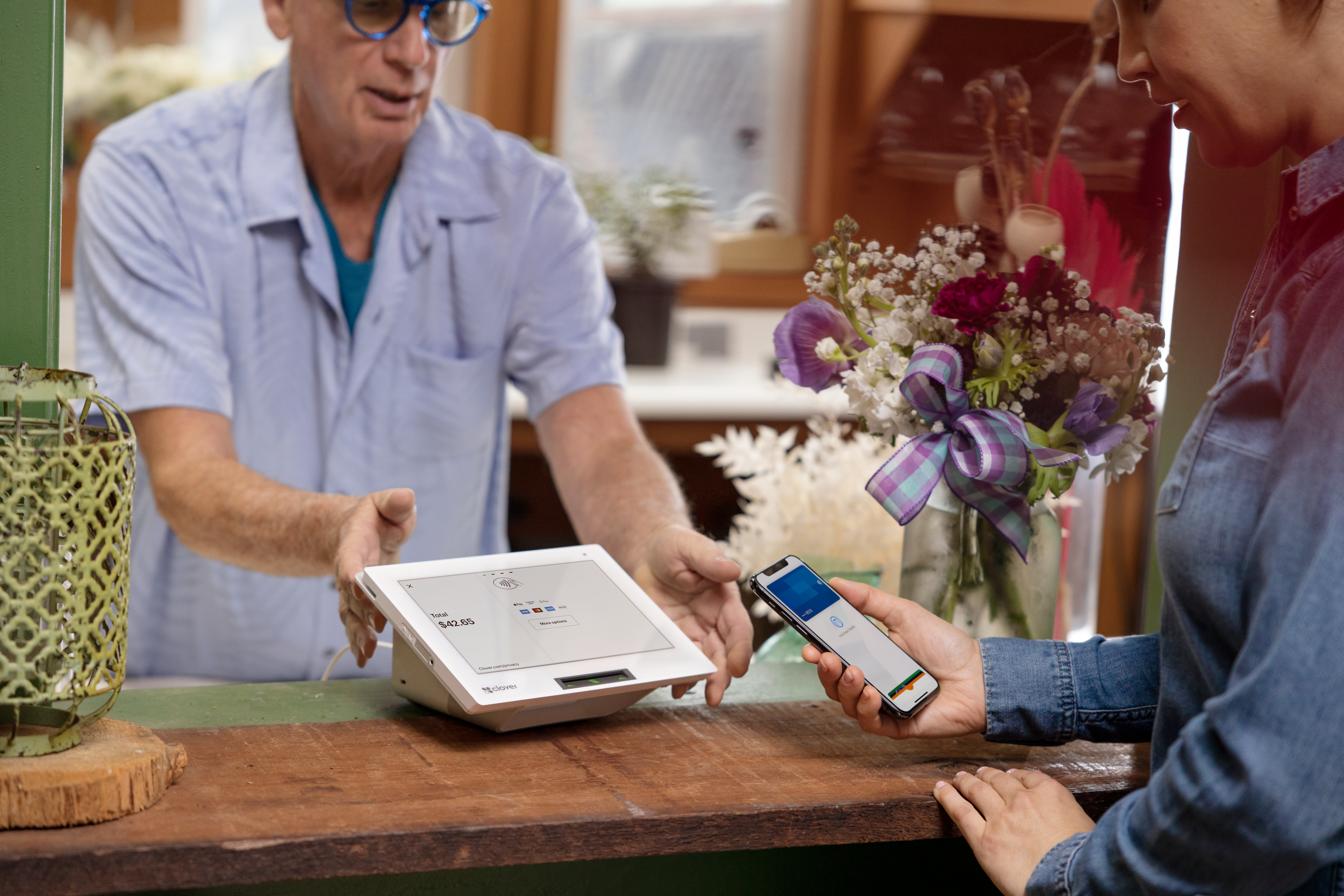 Clover Mini on a retail counter at a flower shop